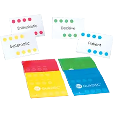 Color-coded personality assessment cards arranged on table.